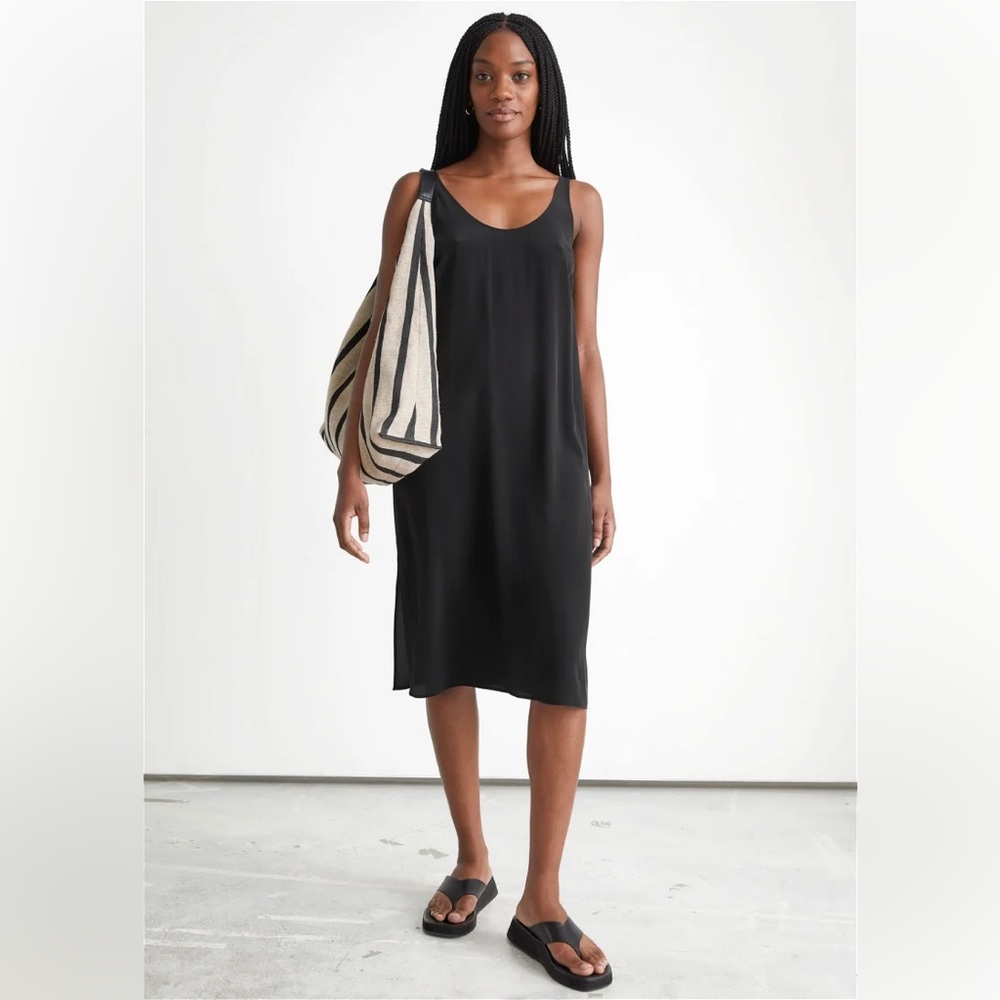 Sleeveless black silk slip dress